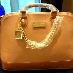 New/Never used Genuine leather hand bag by Joy & Iman.